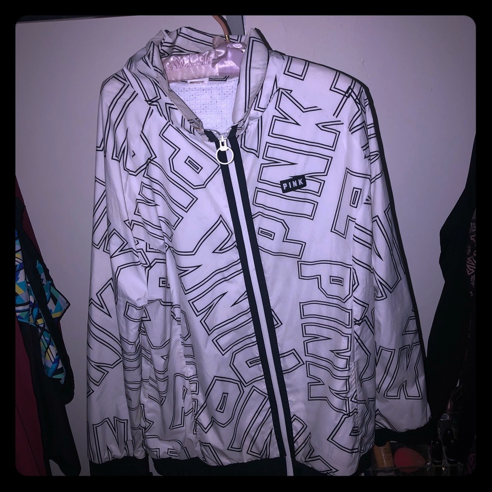 All white & black pink jacket . Barley used